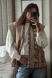 Handcrafted kantha quilt showcasing vibrant patterns as a perfect addition to sustainable fashion home décor.