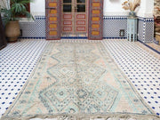 Vintage moroccan rug from Beni mguild, berber handmade area rug - sustainably made MOMO NEW YORK sustainable clothing, rug slow fashion