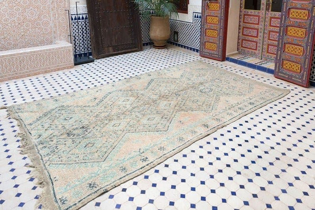 Vintage moroccan rug from Beni mguild, berber handmade area rug - sustainably made MOMO NEW YORK sustainable clothing, rug slow fashion