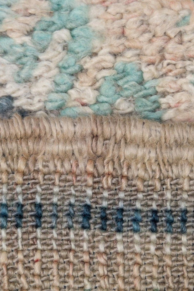 Vintage moroccan rug from Beni mguild, berber handmade area rug - sustainably made MOMO NEW YORK sustainable clothing, rug slow fashion